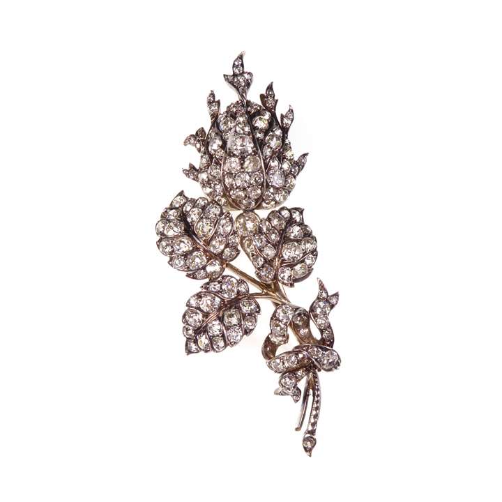 Diamond cluster rose bud spray brooch, naturalistically modelled.